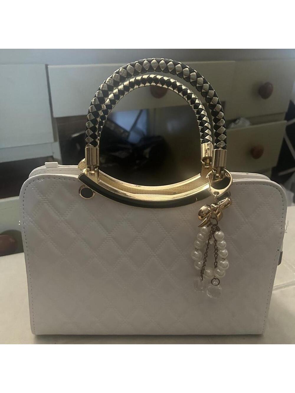 Brand new White quilted handbag with gold hardware and pearl charm